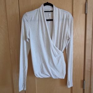 Lululemon long sleeve shirt, size 4 with bottom closure cross in front